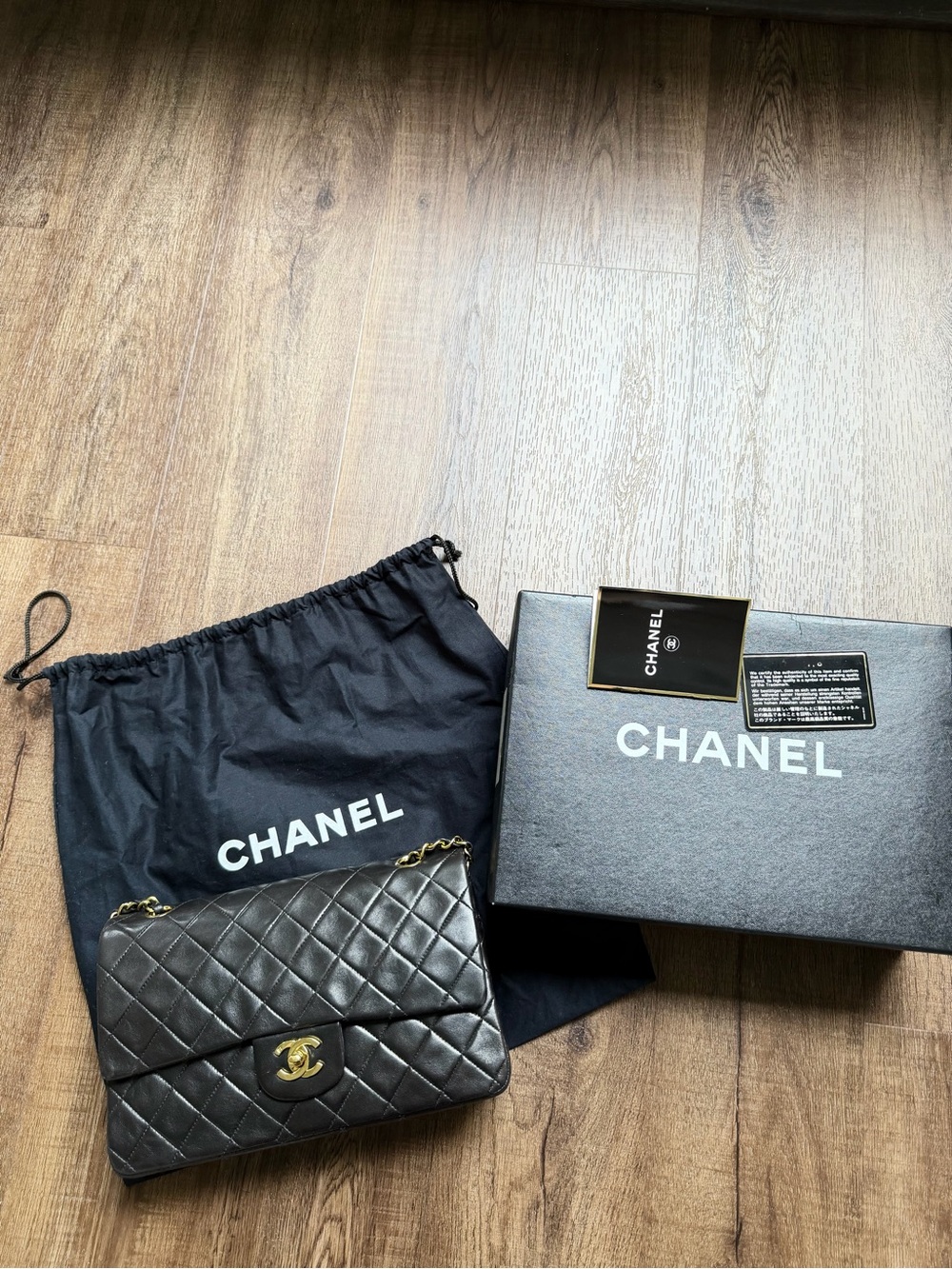 CHANEL Black Quilted Leather Shoulder Bag with Gold Hardware